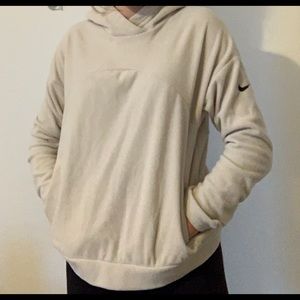 Cream NIKE fuzzy hoodie.
